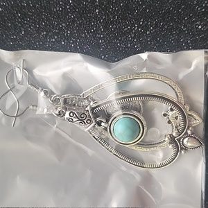Silver turquoise dangle earrings.